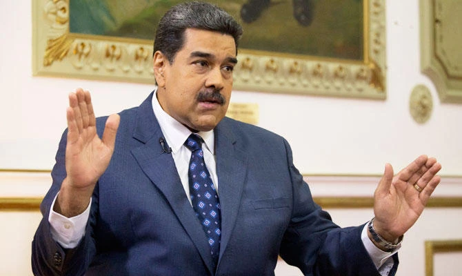 Venezuela's President Nicolas Maduro speaks during an interview with The Associated Press at Miraflores presidential palace in Caracas, Venezuela, Thursday, Feb. 14, 2019. (AP)