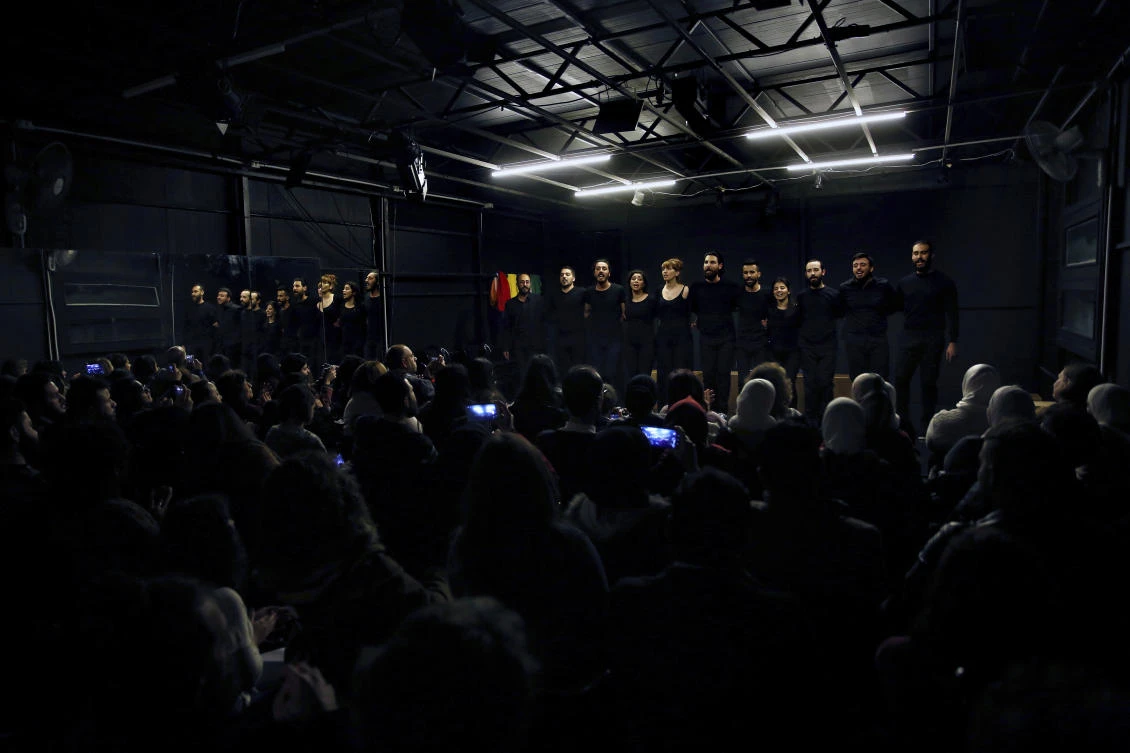 In this Friday, Feb. 8, 2019 photo, a team of Syrian actors takes part in a playback theater at the end of a three-month training session, in Beirut, Lebanon. Syrians from different parts of their war-torn country have gathered inside a theater telling their stories that are later re-acted by a group of Syrians who have been training on playback theater. (AP)