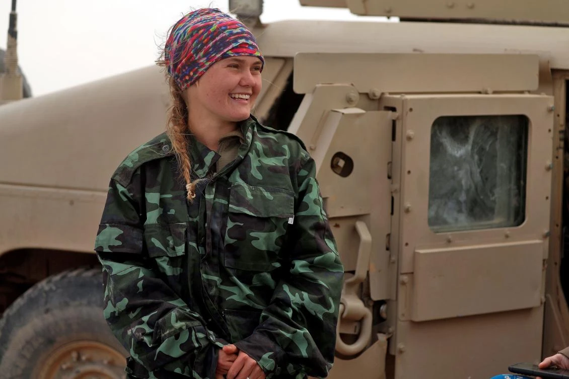 Sahale Eubank, a volunteer with the Free Burma Rangers (FBR), is pictured at a plateau overlooking the embattled Baghouz area in the eastern Syrian province of Deir Ezzor, on February 15, 2019. (AFP)