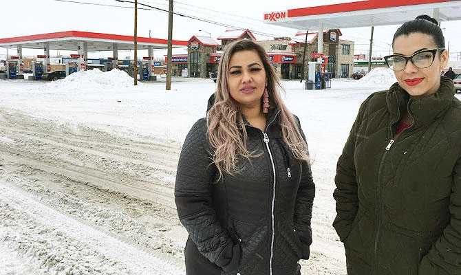 In this Wednesday, Jan. 23, 2019, photo provided by the ACLU of Montana, Martha Hernandez, left, and Ana Suda pose in front of a convenience store in Havre, Mont., where they say they were detained by a U.S Border Patrol agent for speaking Spanish last year. (AP)