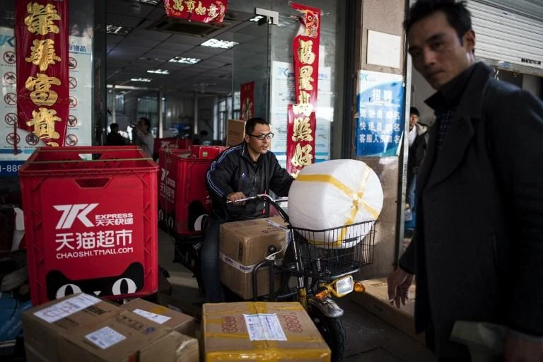China should encourage its banks to support smaller, private firms in the real economy, a central bank official was quoted as saying. (AFP)