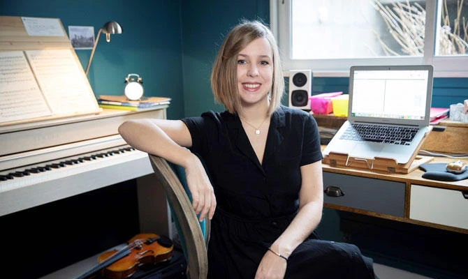 French music composer Camille Pepin poses in her studio in Paris on February 11, 2019. (AFP)