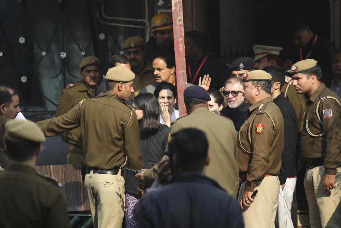 An early morning fire at the Arpit Palace Hotel killed more than a dozen people in the Karol Bagh neighborhood of New Delhi. (AP)