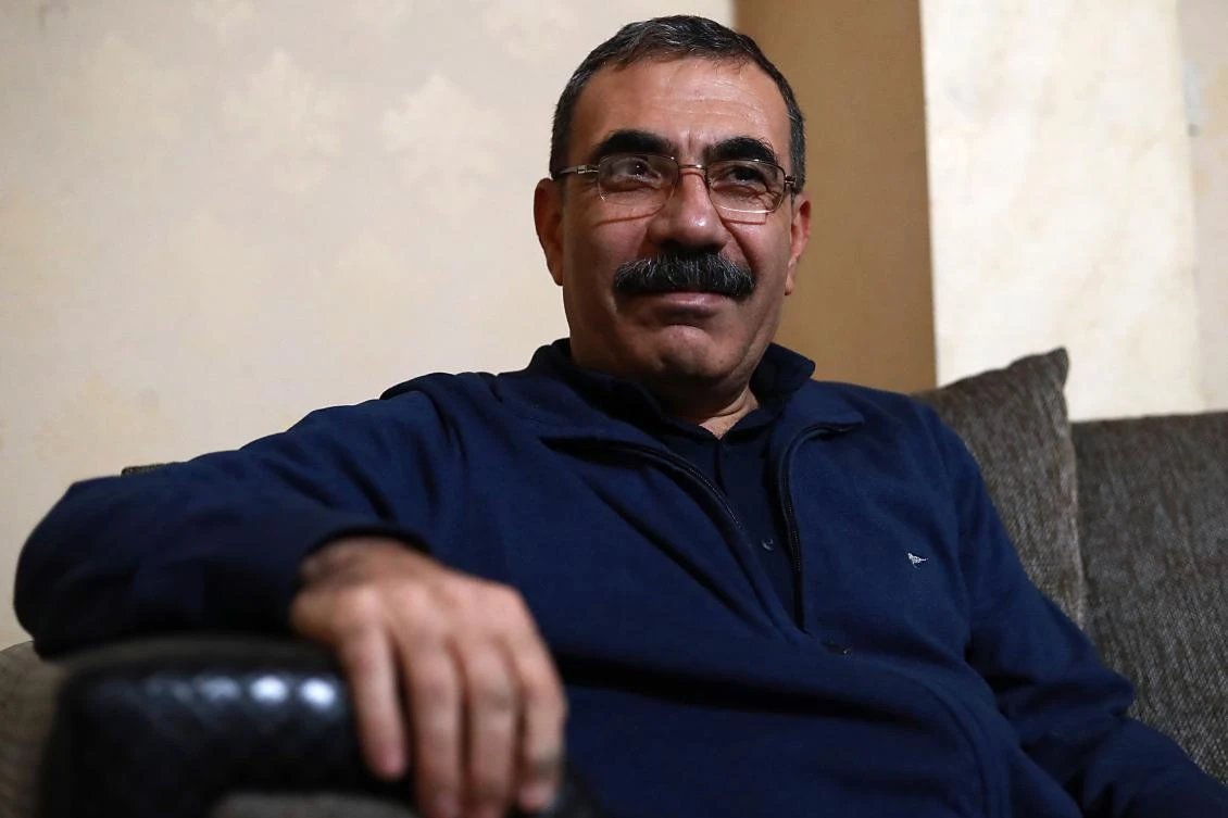 Kurdish official Aldar Khalil played a key role in establishing Syria's semi-autonomous Kurdish region in 2013. (File/AFP)