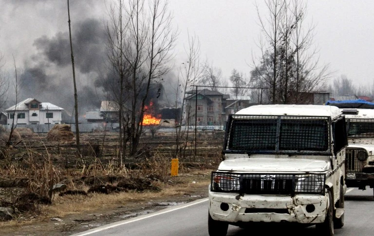 At least seven died in gunfight between Indian forces and Kashmir militants. Above, a suspected shelter of the Kashmir militants. (AFP)