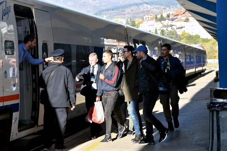 The cold in Bihac trapped more than 5,000 migrants in the area. Above, migrants are boarding a train in Sarajevo in 2018. (AFP)