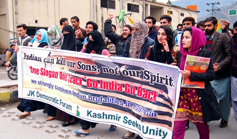 Kashmiri students rally against the Indian government in Muzaffarabad, capital of Pakistani Kashmir, Wednesday, Feb. 20, 2019. India has halted a key bus service with the Pakistani-controlled part of Kashmir, severing the only land route linking the divided Himalayan region. (AP)