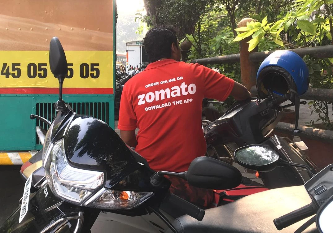 A surge in the popularity of food delivery apps such as Uber Eats, Swiggy and Zomato has led to questions about workers’ rights in India’s growing gig economy. (AFP)