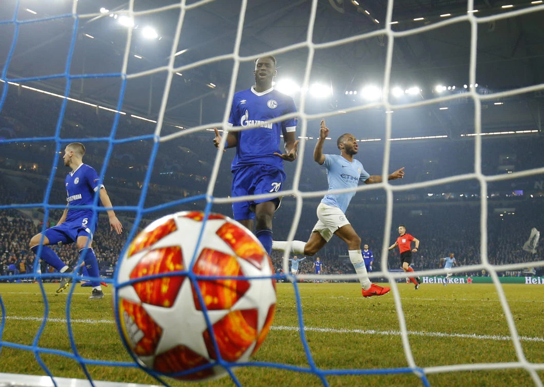Raheem Sterling celebrates his winner on an up and down night for City at Schalke. (AFP)