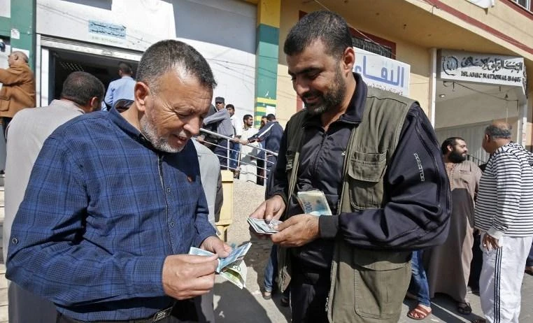 Palestinians to cut civil servant salaries after Israeli tax freeze