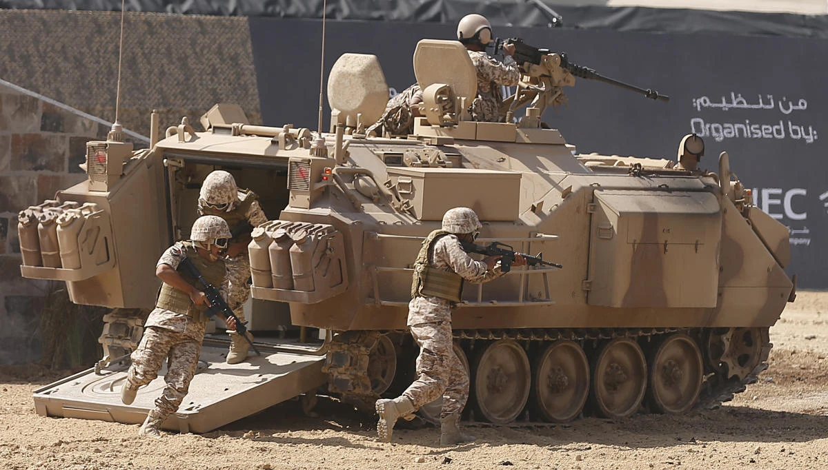 Members of the United Arab Emirates’ armed forces take part in a military show launching the International Defense Exhibition and Conference (IDEX) in Abu Dhabi. (AFP)