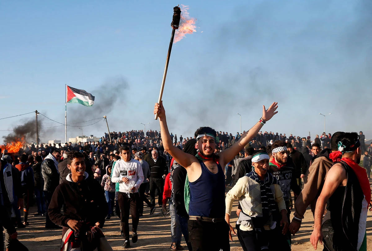 Palestinians protest in Gaza and Jerusalem, 1 killed