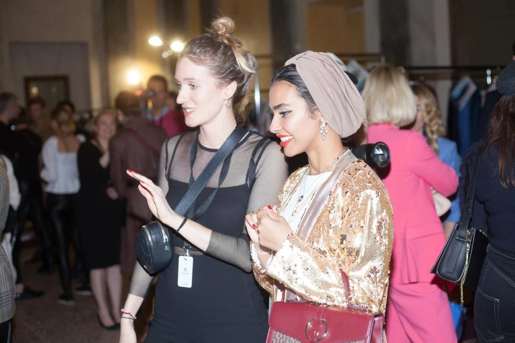 Salama Mohamed, right, attended the Aigner show in Milan. (Image supplied)