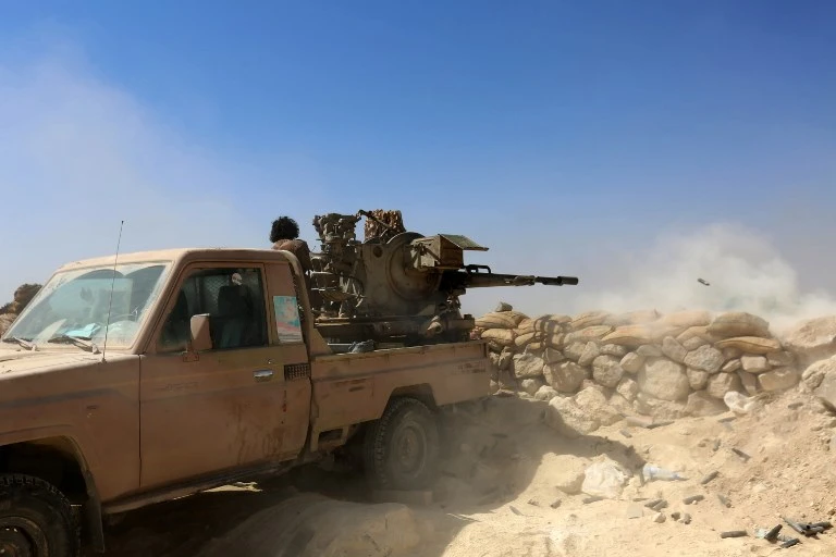 Yemeni tribesmen from the Popular Resistance Committees, who support forces loyal to the Saudi-backed Yemen president, fire towards Shiite Huthi rebels at Nihm district, on the eastern edges of the capital Sanaa, on February 2, 2018. (File/AFP)