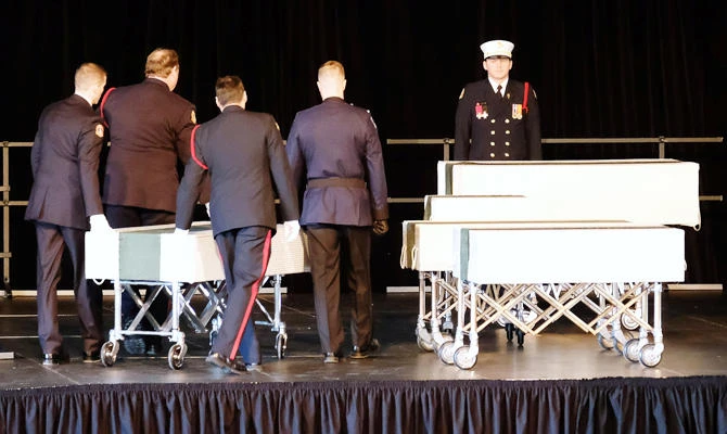 Halifax Regional Police and Fire Honour Guard move one of the caskets of the Barho family children during a funeral service for the Syrian refugee family who lost seven children in a February 19 house fire in Halifax, Nova Scotia, Canada February 23, 2019. (REUTERS)