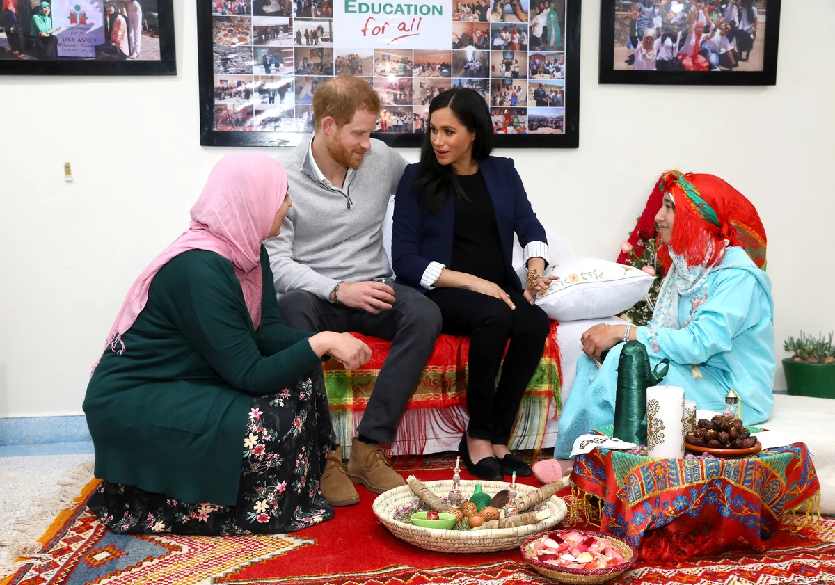 Prince Harry and Meghan are seen during a henna ceremony as they visit a boarding house for girls run by the Moroccan NGO ‘Education for All’ in Asni, Morocco, on Sunday. (Reuters)
