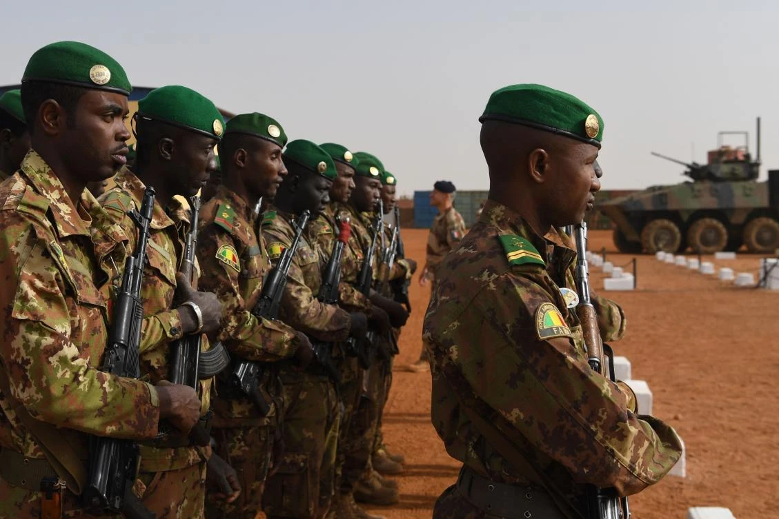 Malian troops stand guard prior to the visit of the French Prime Minister at the Operation Barkane military French base in Gao, Mali, on February 24, 2019. (AFP)