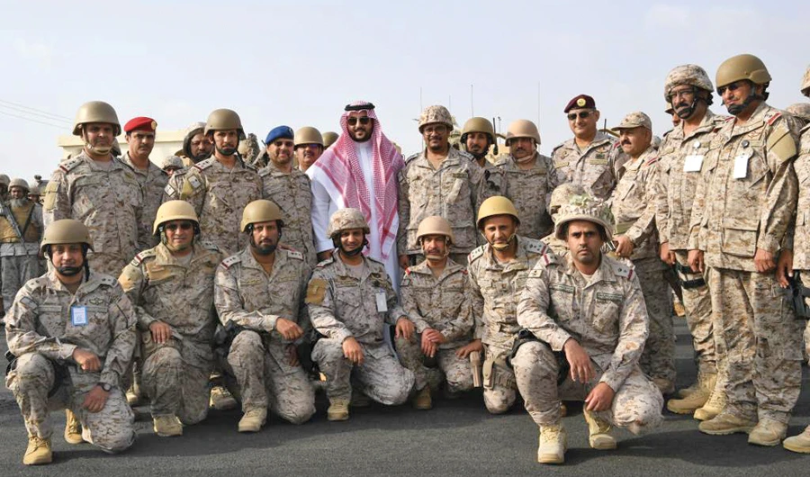 Deputy Defense Minister Prince Khalid bin Salman with Saudi soldiers stationed at the Kingdom’s southern border. (SPA)