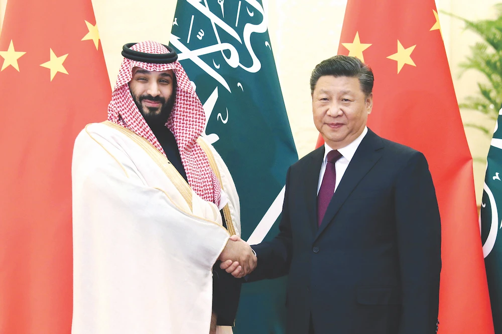 Saudi Crown Prince Mohammed bin Salman shakes hands with Chinese President Xi Jinping during his official visit to China. (AP)
