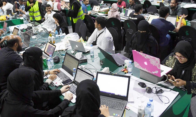 Participants including Saudi women attend a hackathon in Jeddah on August 1, 2018, prior to the start of the annual Hajj pilgrimage in the holy city of Makkah. (AFP)