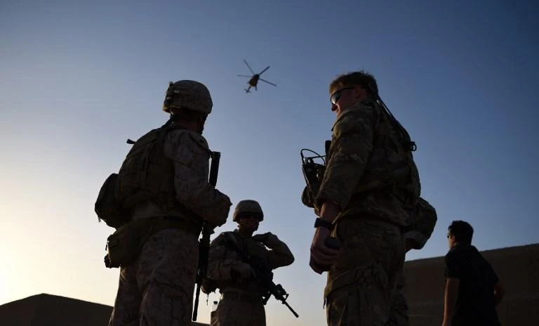 It seems the sides are discussing the withdrawal of US troops from Afghanistan, in aims of settling a war that has been going on for 17 years. Above, Afghan and US soldiers participate in a military training in Afghanistan in 2017. (AFP/File)