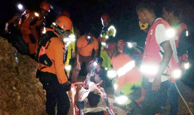 Indonesia says at least three killed, 60 feared buried in illegal mine collapse