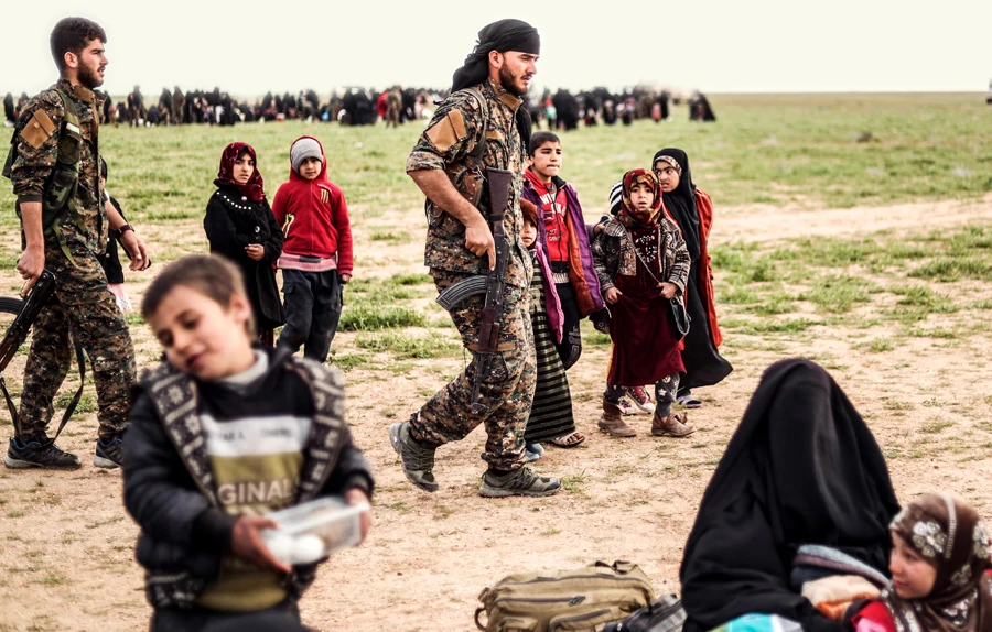 US-backed forces evacuate families before final assault on militants
