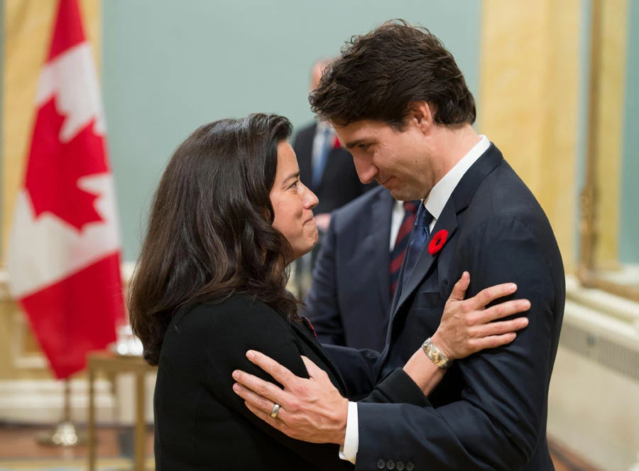 In this file photo taken on November 04, 2015, Canadian Prime Minister Justin Trudeau speaks with Minister of Justice Jody Wilson-Raybould during a swearing-in ceremony at Rideau Hall in Ottawa. (AFP / file photo)