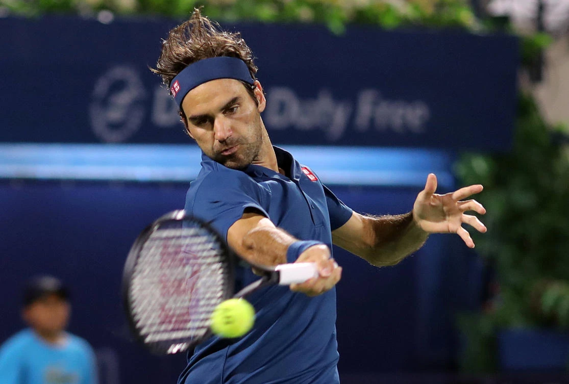 Switzerland's Roger Federer in action during his quarter final match against Hungary's Marton Fucsovics. (Reuters)