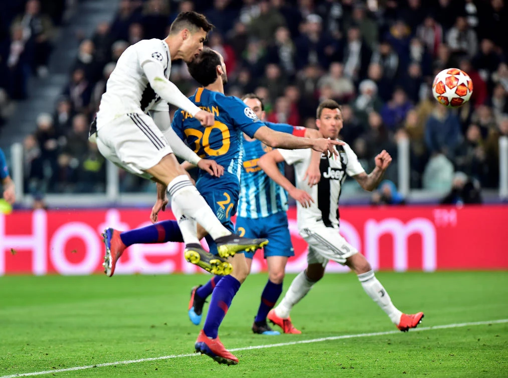 Soccer Football - Champions League - Round of 16 Second Leg - Juventus v Atletico Madrid - Allianz Stadium, Turin, Italy - March 12, 2019 Juventus' Cristiano Ronaldo scores their first goal REUTERS/Massimo Pinca
