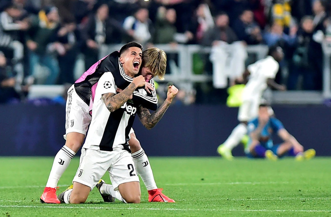 FILE PHOTO: Soccer Football - Champions League - Round of 16 Second Leg - Juventus v Atletico Madrid - Allianz Stadium, Turin, Italy - March 12, 2019 Juventus' Joao Cancelo celebrates after the match REUTERS/Massimo Pinca/File Photo
