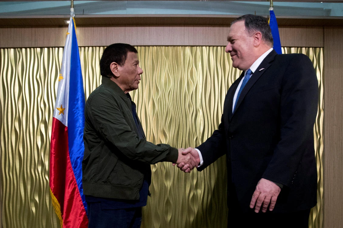 US Secretary of State Mike Pompeo shakes hands with Philippines President Rodrigo Duterte at Col. Jesus Villamor Airbase in Manila on Feb. 28, 2019. (Reuters)