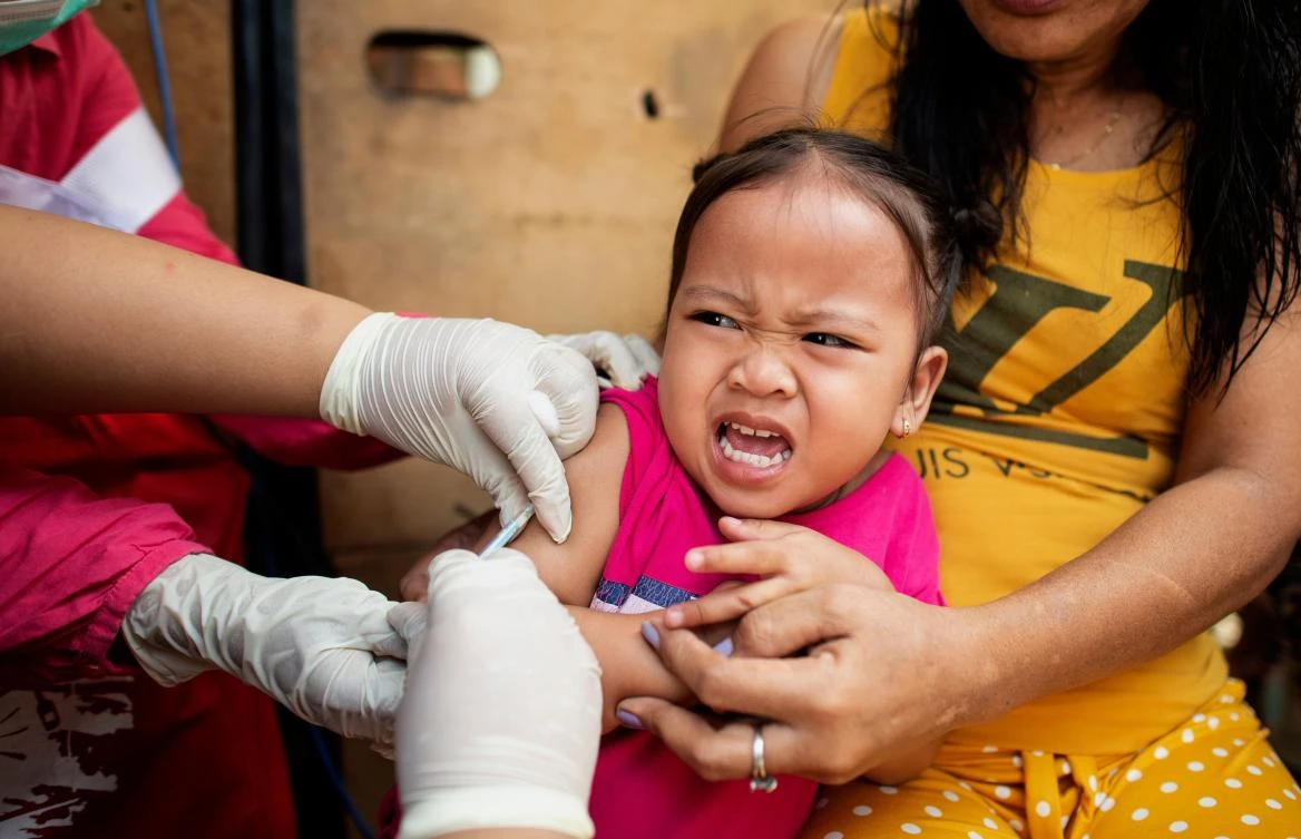 A growing measles outbreak in the Philippines killed at least 25 people last month, officials said, putting some of the blame on mistrust stoked by a scare over an anti-dengue fever vaccine. (File/AFP)