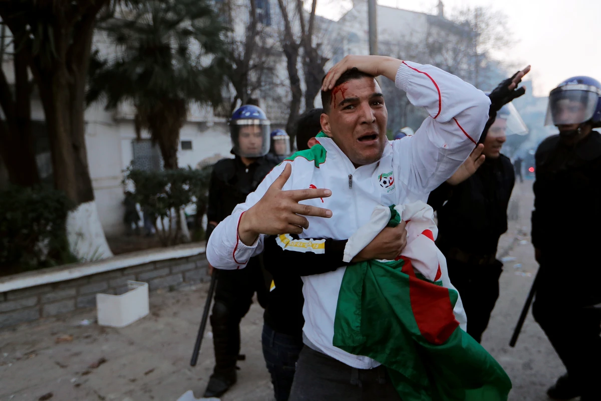 Riot police officers detain a man protesting in Algiers against President Abdelaziz Bouteflika's plan to extend his 20-year rule. (Reuters)riot police officers clash with people protesting against President Abdelaziz Bouteflika's plan to extend his 20-year rule by seeking a fifth term in April elections in Algiers, Algeria, March 1, 2019. REUTER