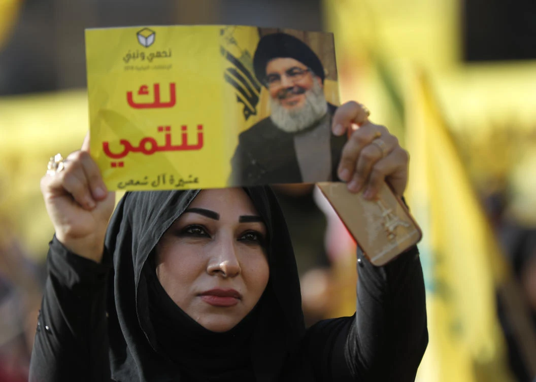 The Lebanese Hezbollah group has strongly rejected the British government's move to ban the group as a terrorist organization.(AP)