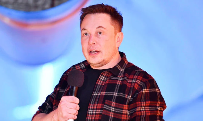 In this file photo taken on December 18, 2018 Elon Musk, co-founder and chief executive officer of Tesla Inc., speaks during an unveiling event for the Boring Company Hawthorne test tunnel in Hawthorne, south of Los Angeles, California. (AFP)