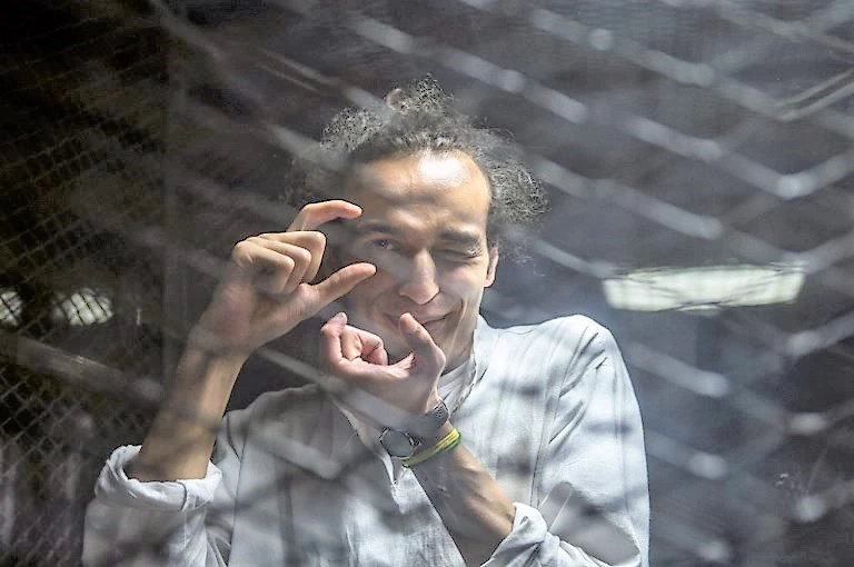 Mahmoud Abu Zaid, a photojournalist known as ‘Shawkan,’ was ordered released by a court in September but remained in jail as authorities said his release was being processed. (AFP)