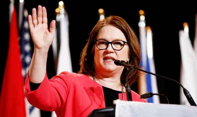 Leading minister resigns over scandal that threatens Trudeau
