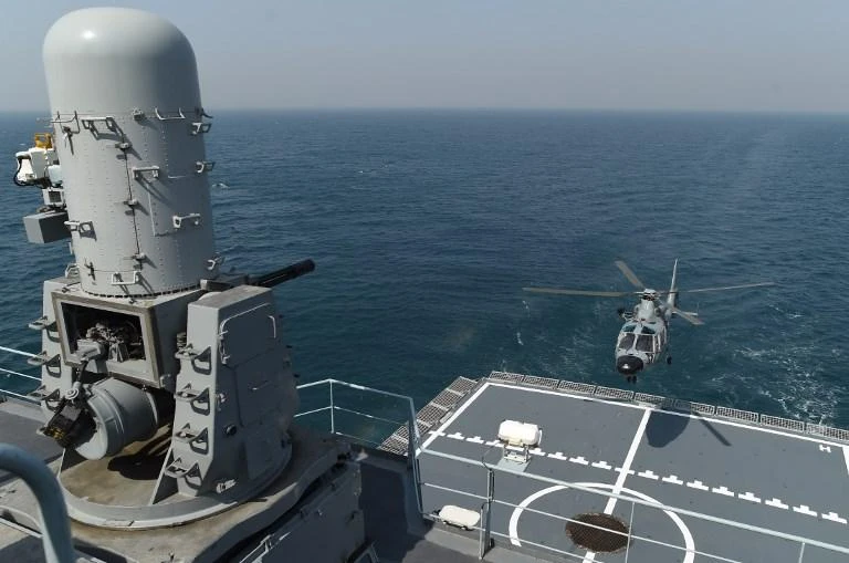 A naval helicopter lands on the Pakistani navy ship Moawin during the multinational naval exercises AMAN-19 in the Arabian Sea near Karachi on February 11, 2019. (AFP)