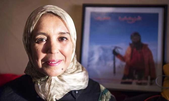 Moroccan mountaineer Bouchra Baibanou is pictured in her home in the Sidi Moussa district of Sale near Rabat on November 29, 2018. (AFP)