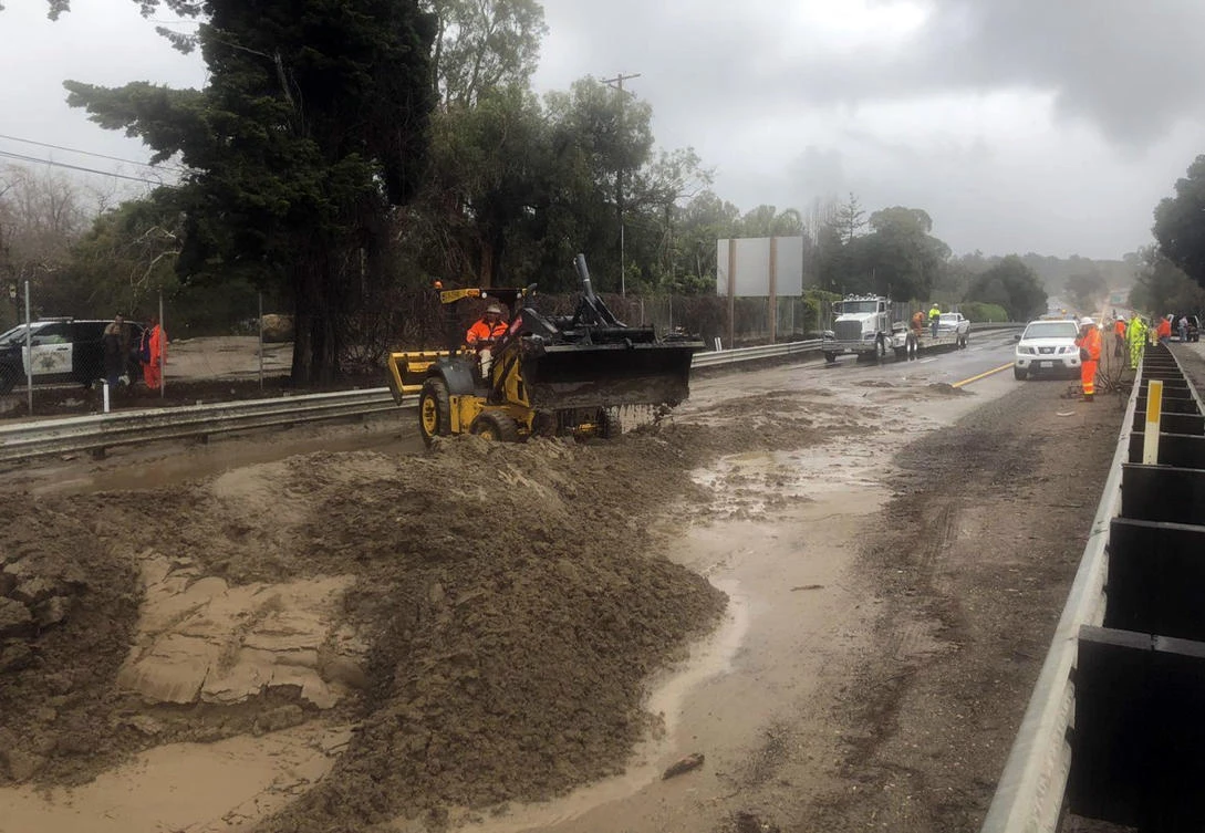 Heavy equipment working to clear US Highway 101 following heavy rains in the Montecito area of Santa Barbara County, California. (Santa Barbara County Fire Department via AP)