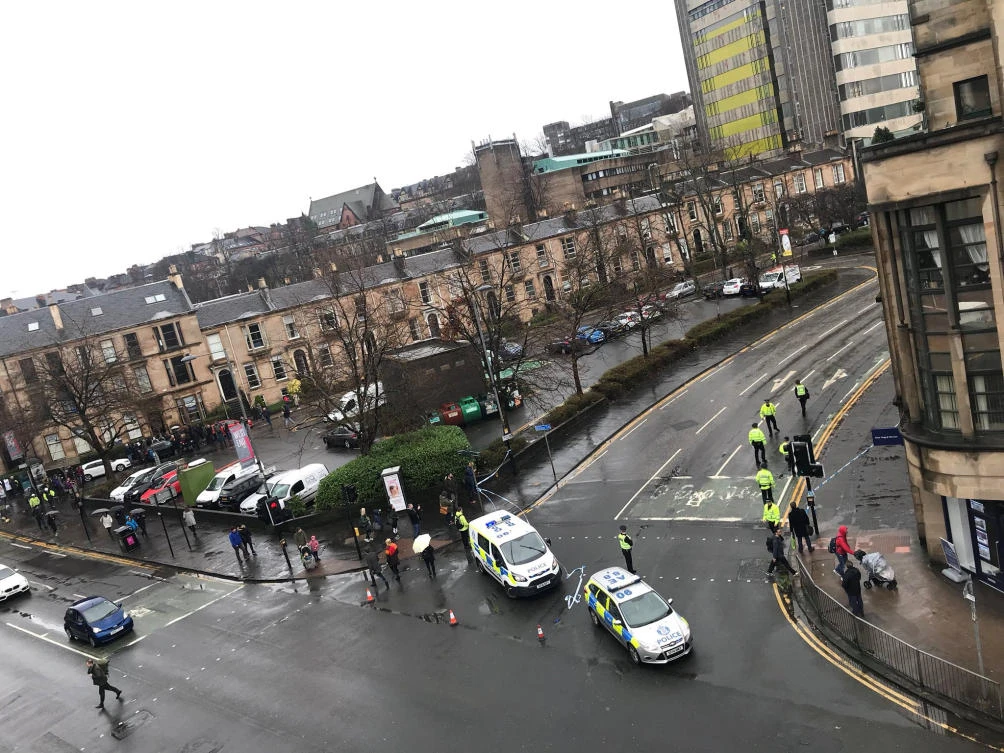 Emergency responders are seen outside Glasgow University after a suspect package was discovered. (Reuters)