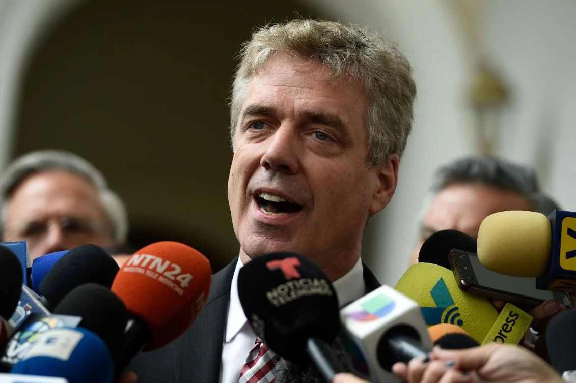 In this file photo taken on February 19, 2019 German ambassador to Venezuela Daniel Kriener speaks to journalists after attending a meeting with Venezuela's opposition leader and self-proclaimed acting president Juan Guaido, at the National Assembly in Caracas. (AFP)