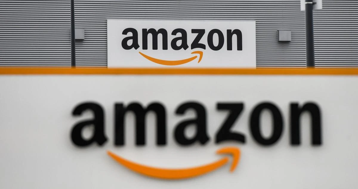A picture shows the Amazon logo at the entrance area of the Amazon logistics centre in Lauwin-Planque, northern France, on March 4, 2019. (AFP)