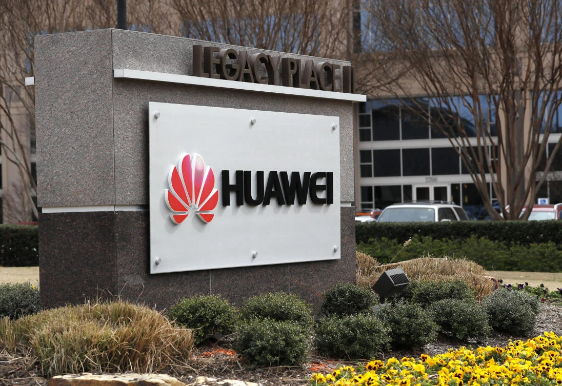 A sign is displayed outside the Huawei Technologies Ltd. business location in Plano, Texas, Thursday, March 7, 2019. (AP/Tony Gutierrez)
