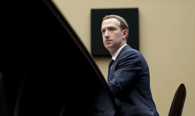 In this April 11, 2018, photo, Facebook CEO Mark Zuckerberg listens to a question as he testifies before a House Energy and Commerce hearing on Capitol Hill in Washington, about the use of Facebook data to target American voters in the 2016 election and data privacy. (AP Photo/Andrew Harnik)
