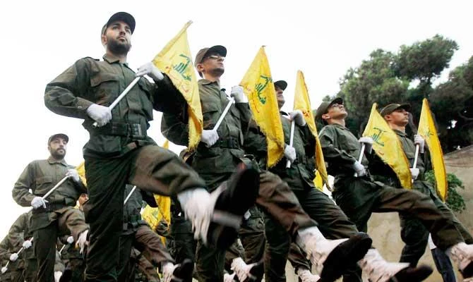 In this Nov. 12, 2010 file photo, Hezbollah fighters parade during the inauguration of a new cemetery for their fighters who died in fighting against Israel, in a southern suburb of Beirut, Lebanon. (AP)