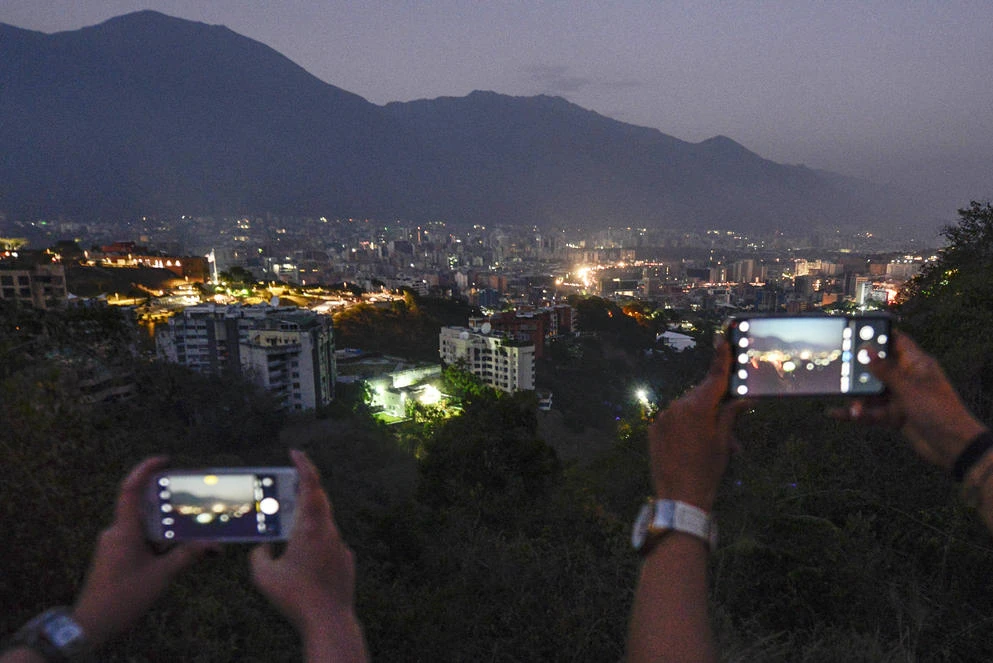 Venezuela’s Guaido calls for massive protest as blackout drags on