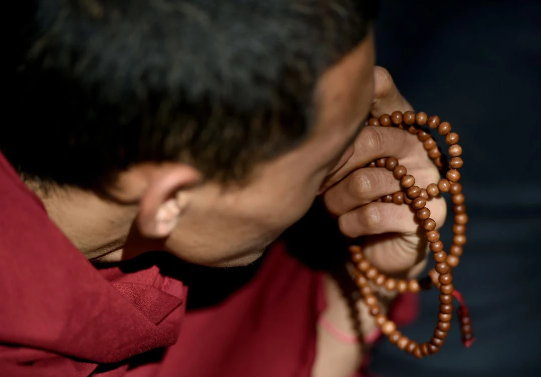 Crowds gathered March 10 at the Dalai Lama’s temple in India to commemorate 60 years since the failed Tibetan uprising against Chinese rule that drove the spiritual leader into exile. (AFP)