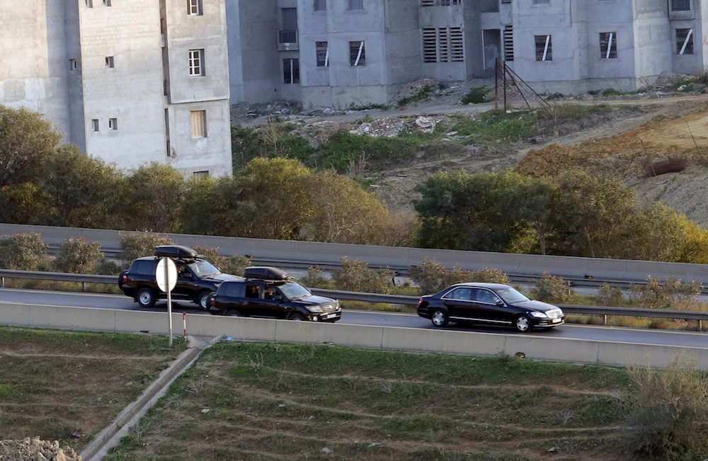 Image Caption : A convoy believed to be carrying Algeria's President Abdelaziz Bouteflika is pictured while driving along the highway in Algiers, Algeria March 10, 2019. (Reuters)